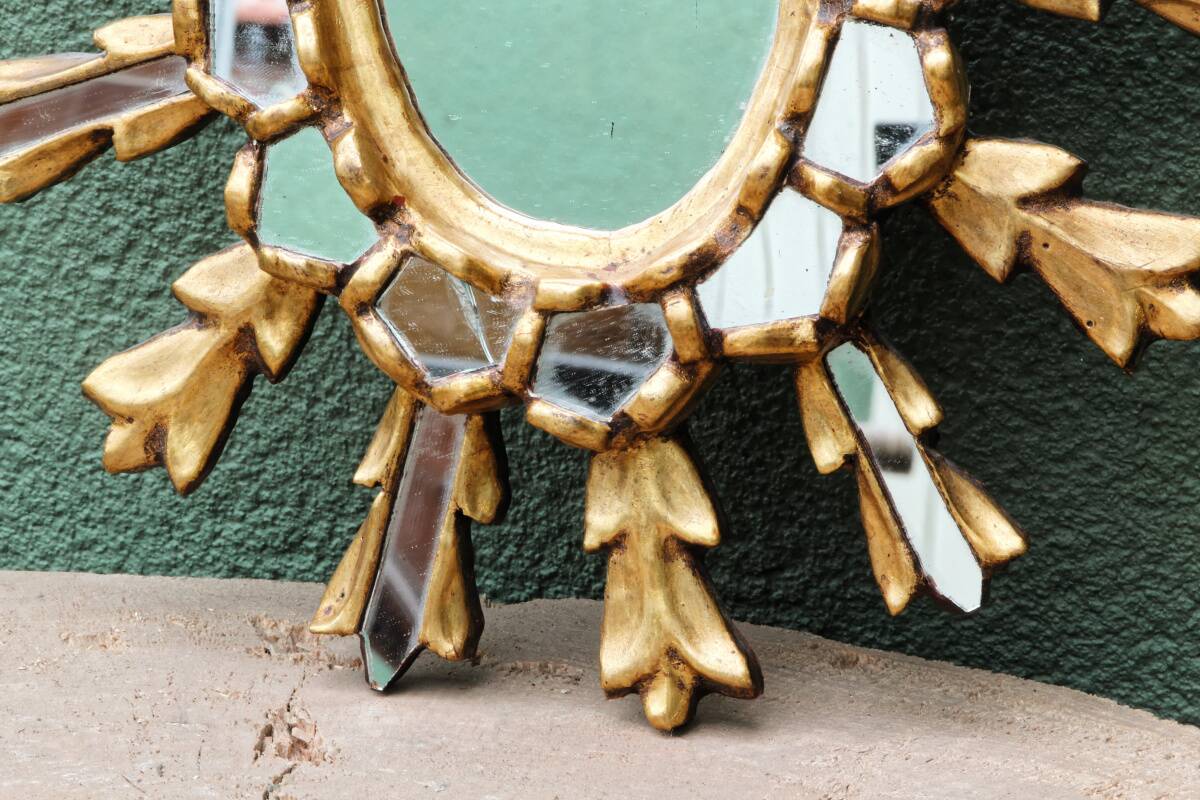 Sun mirror with parecloses, carved wood