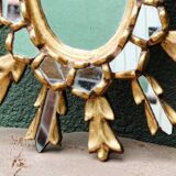 Sun mirror with parecloses, carved wood