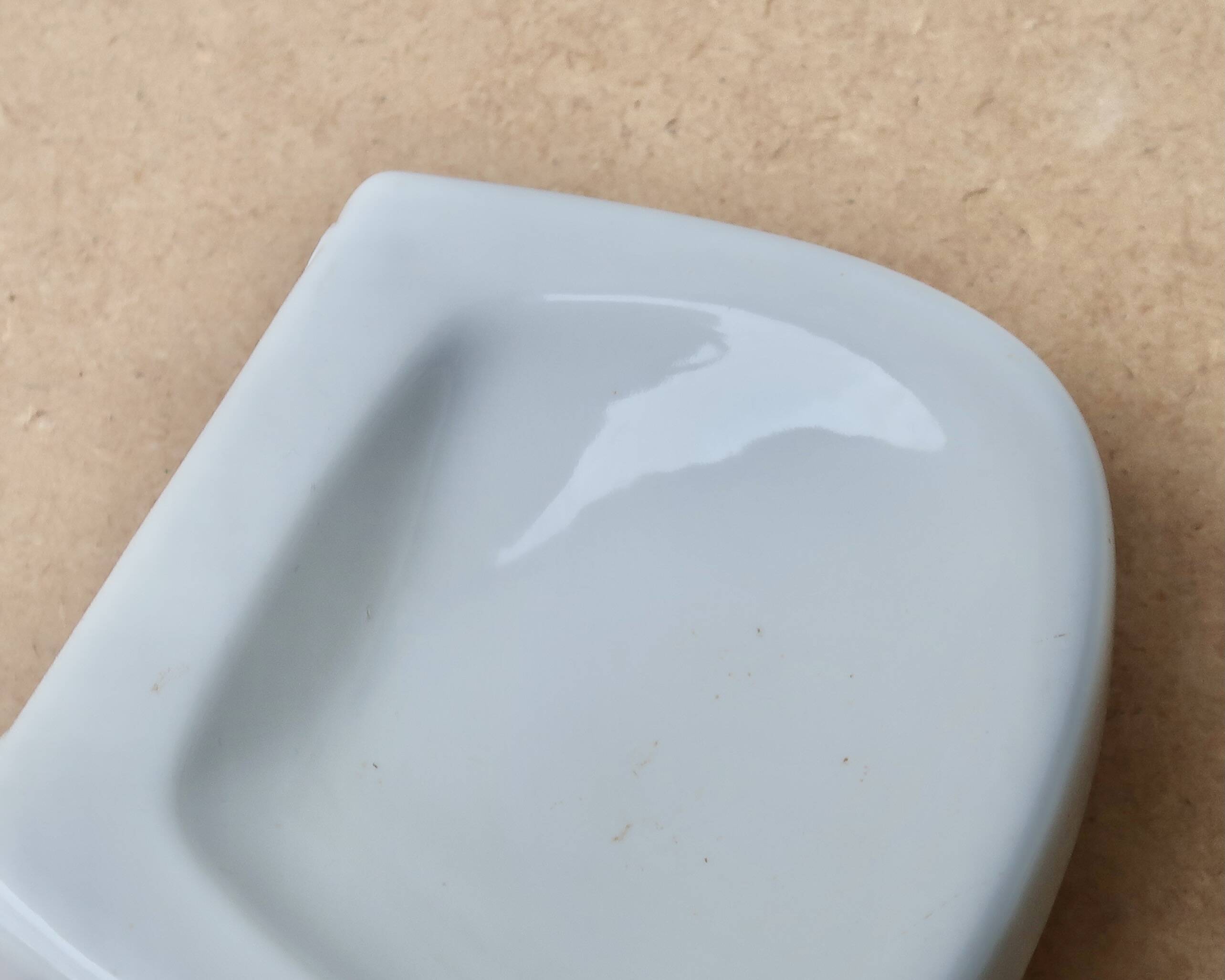 White wall-mounted soap dish in porcelain, 1950s.
