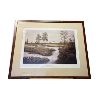 Framed lithograph depicting a watercourse