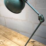 Old green industrial desk lamp