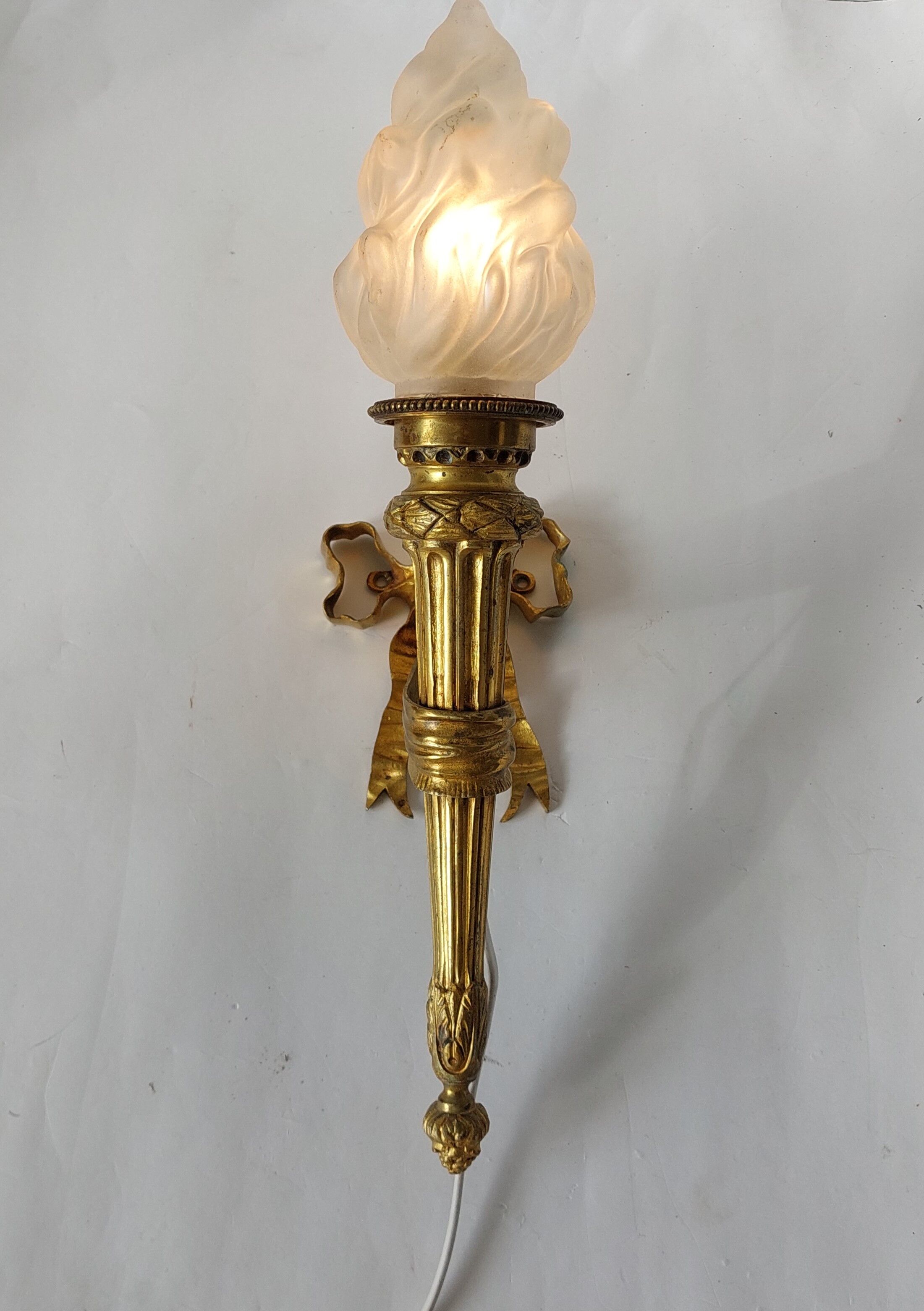 Torch wall lamp in gilded bronze Louis XVI Circa Napoleon III style.