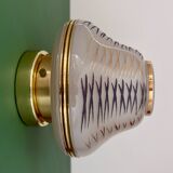 Vintage Art Deco globe wall/ceiling light in white, black, and gold glass.
