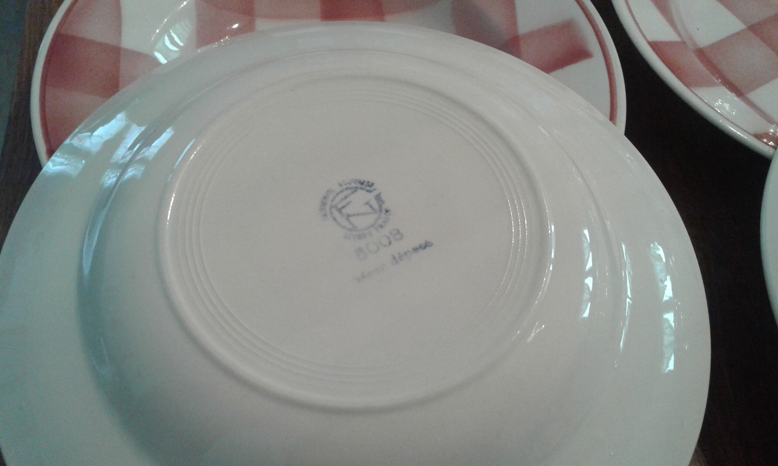 9 hollow plates with red checkers. Givors .vintage