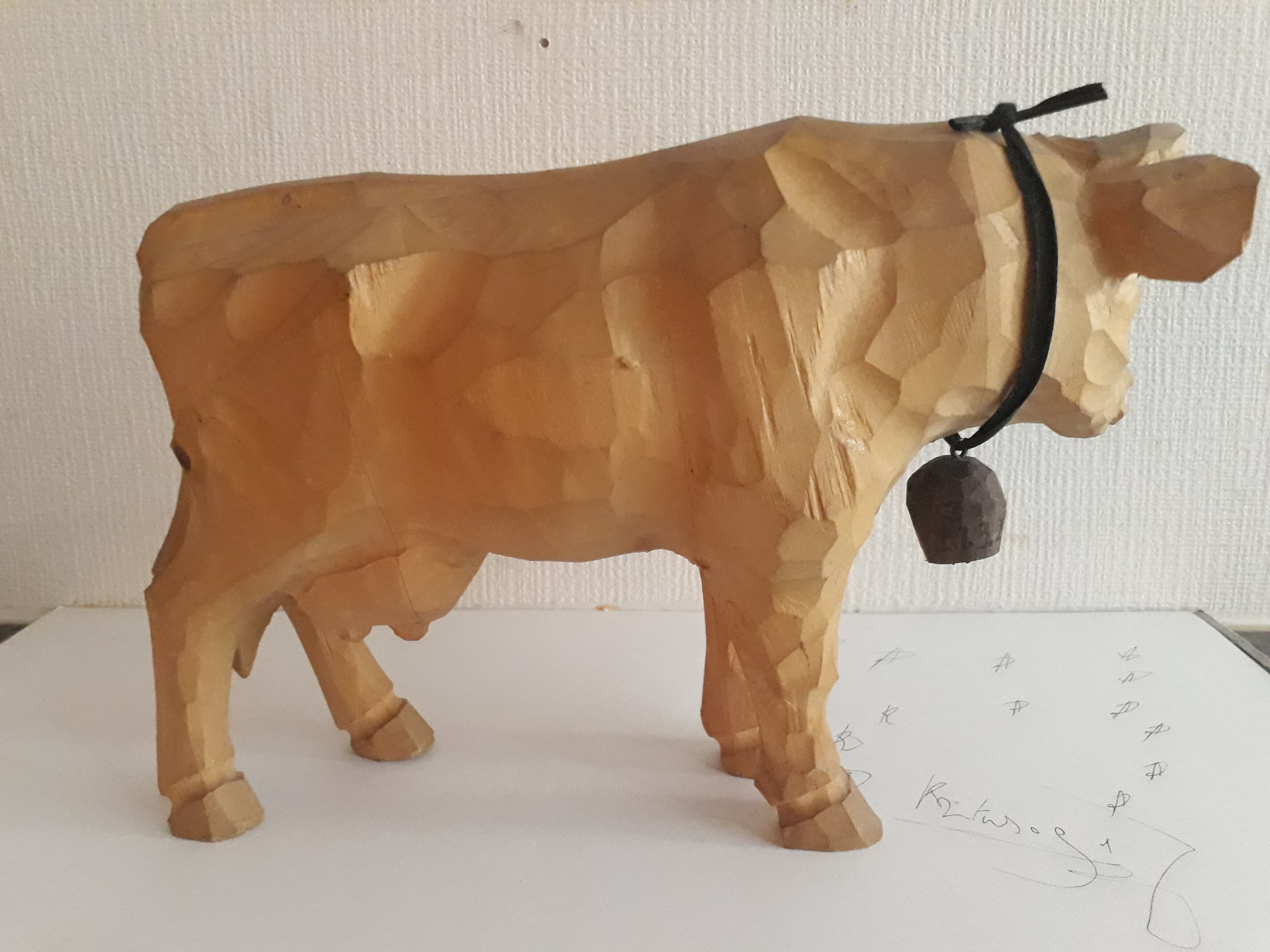 Carved wooden cow