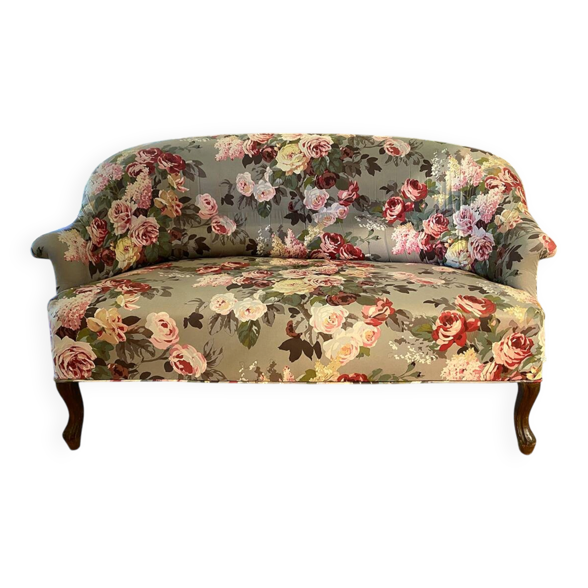 Canapé Napoléon III garni d’un tissu à motif de fleurs