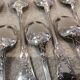 10 silver-plated metal coffee spoons, PG style, Art Nouveau flowers.
