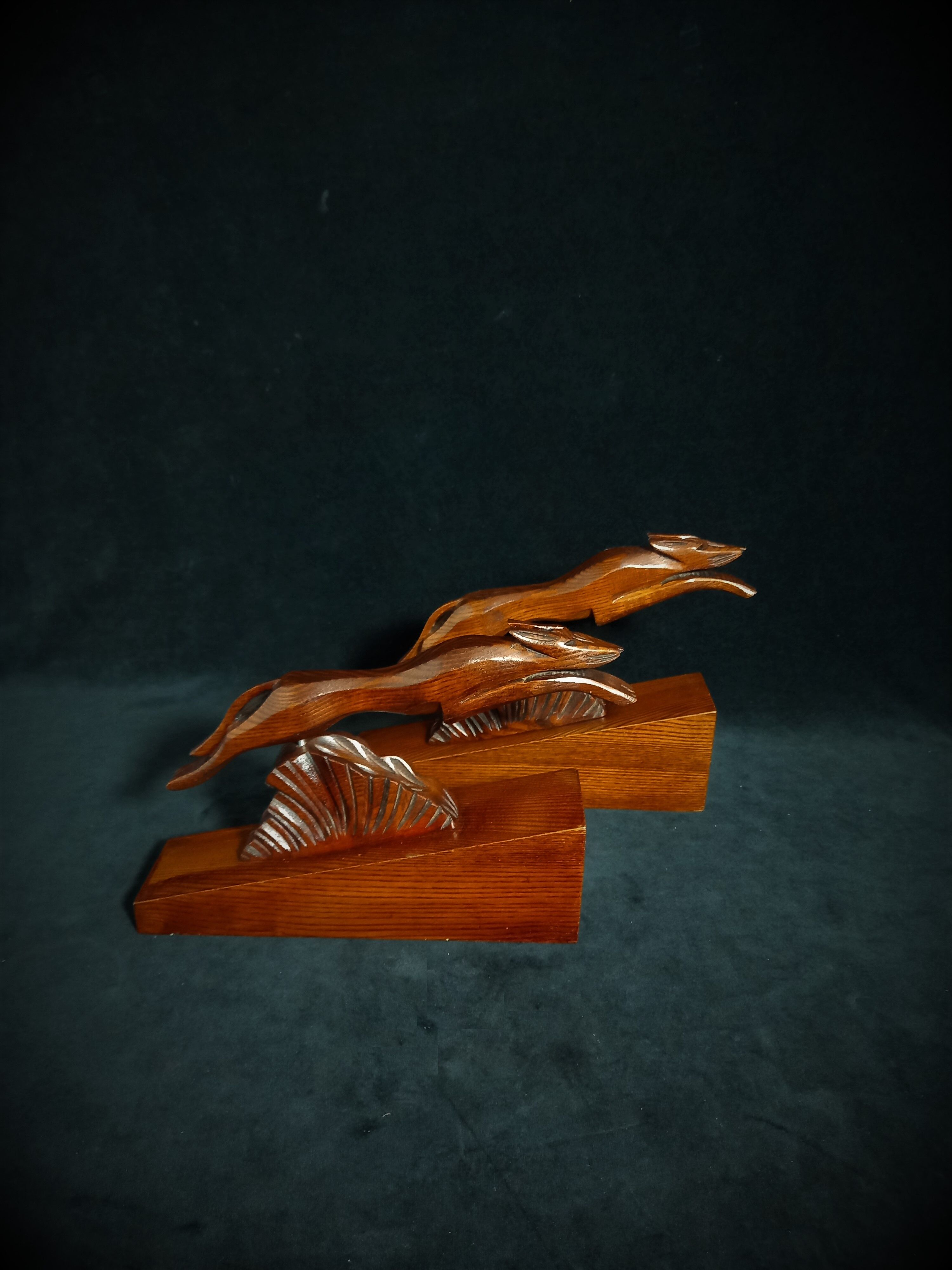 Pair of art deco wooden bookends with greyhounds