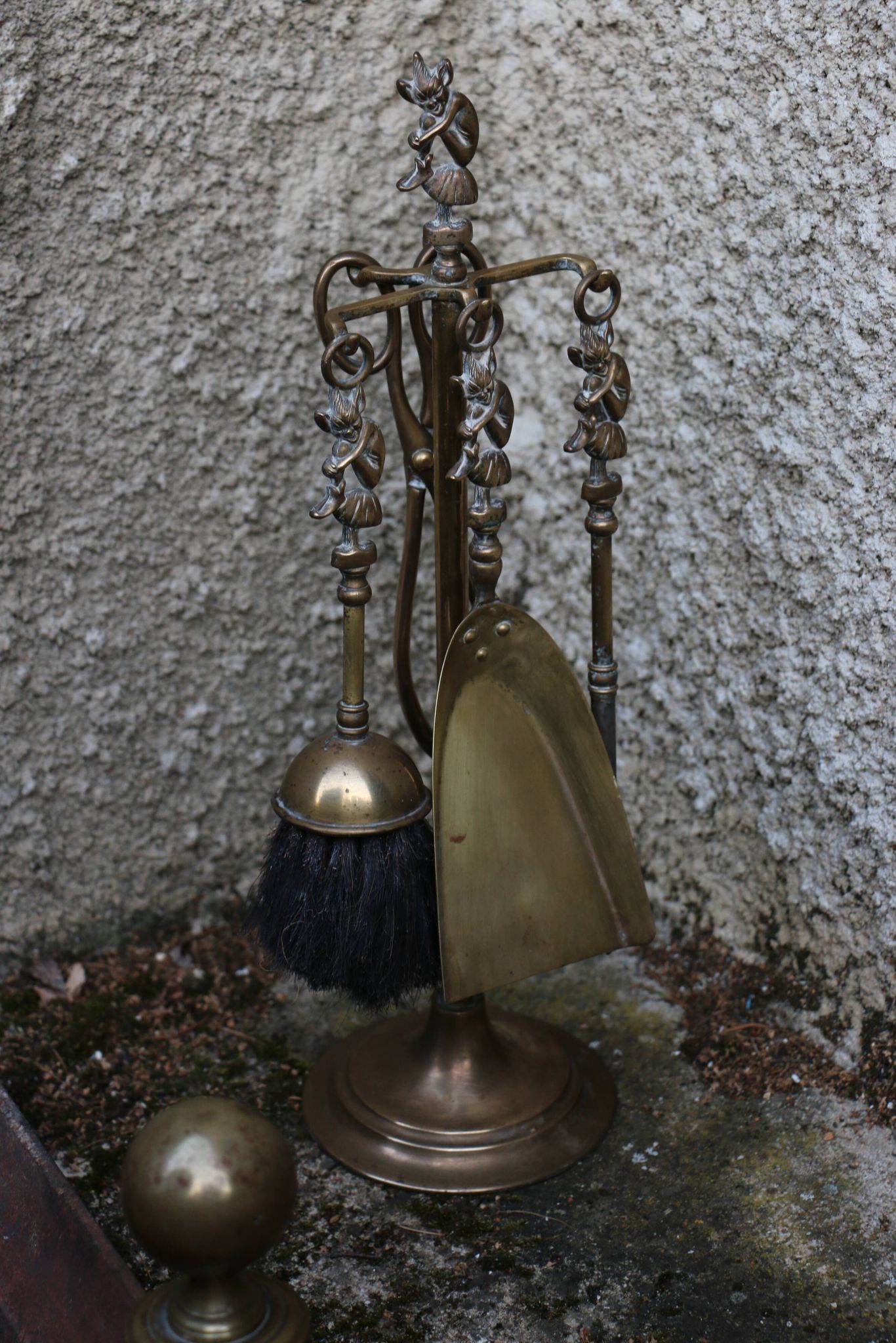 Brass fireplace servant with pair of cast iron pegs with vintage brass ball year 60