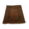 Oriental ethnic red background carpet with handmade fringe