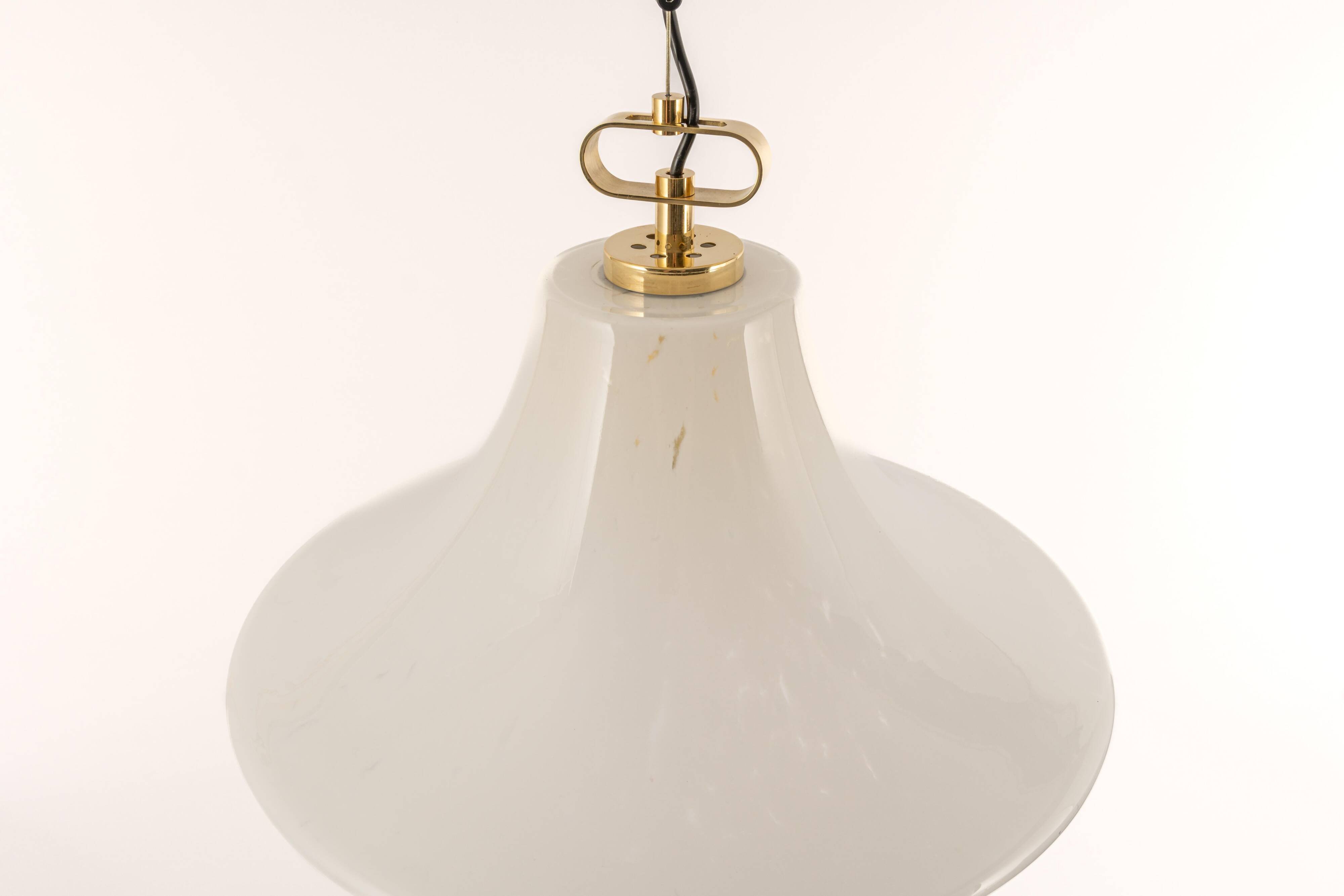 Large suspended brass luminaire from Limburg with opaline glass, Germany, 1970s.