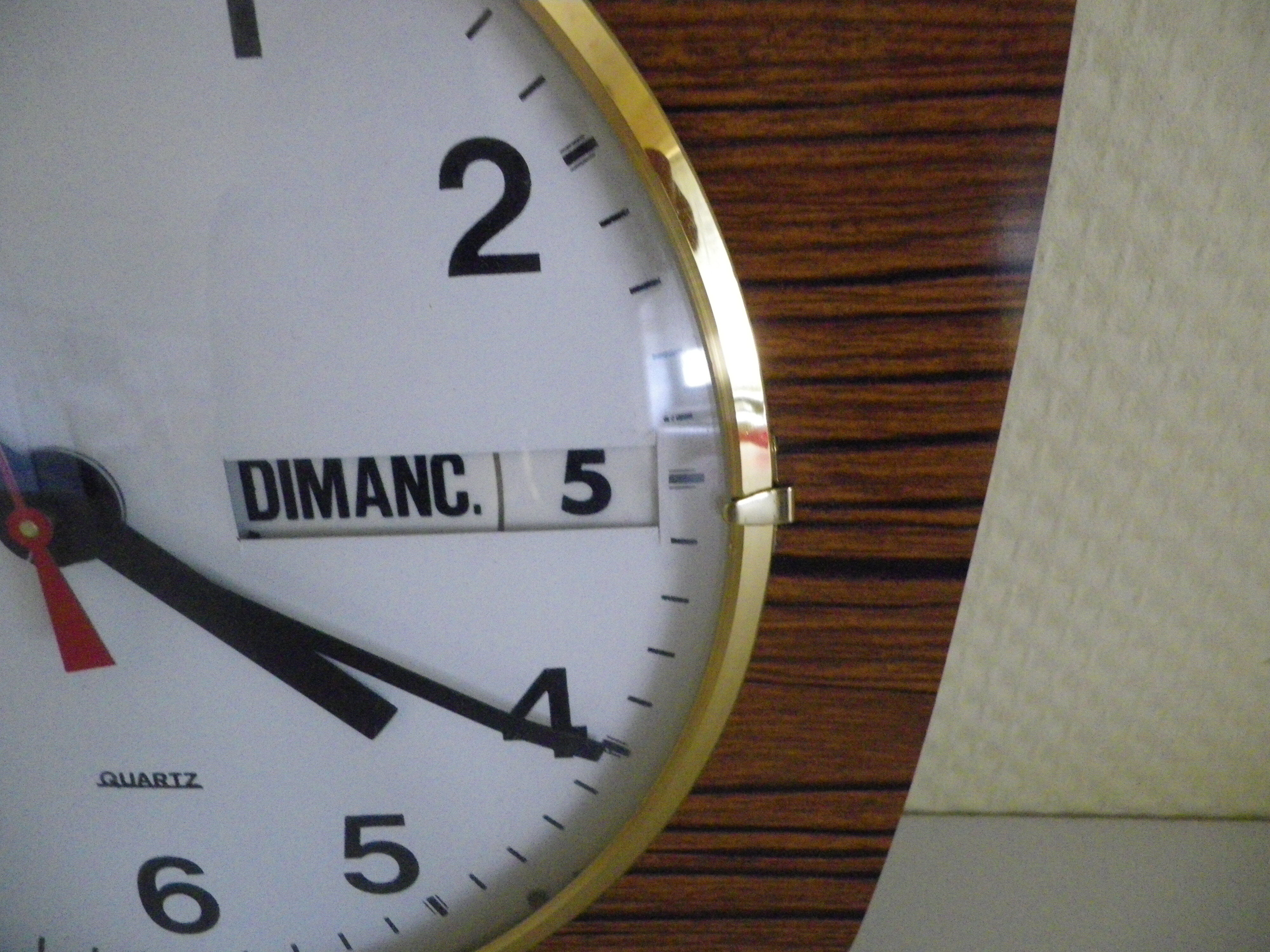 Formica wall clock with day and date - 1970s