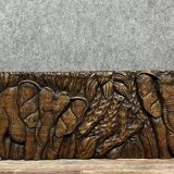 Central Africa 20th century: carved wooden panel in bas-relief of elephants