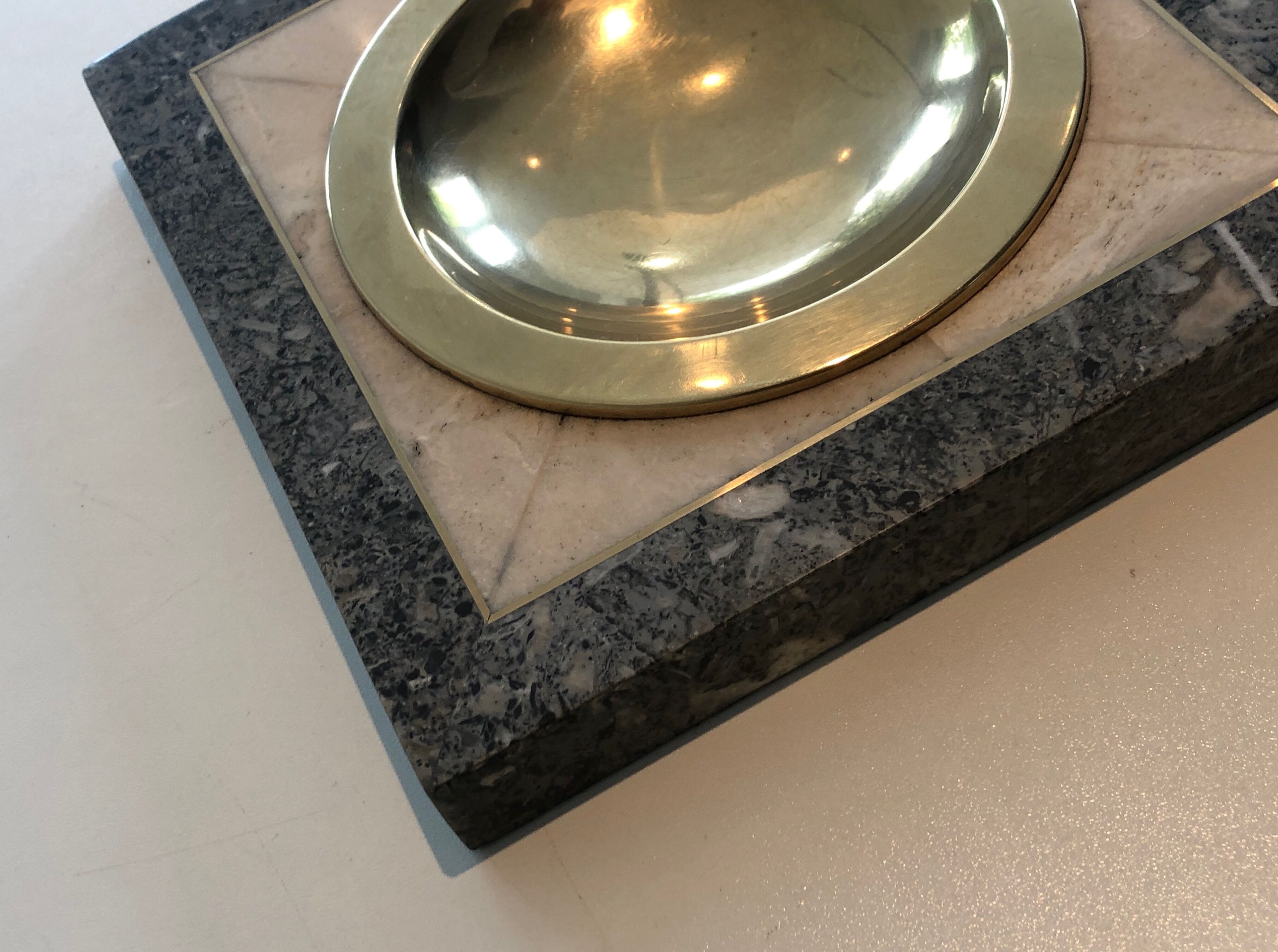 Neoclassical style pocket empty in faux-marble and brass. french work. around 1970