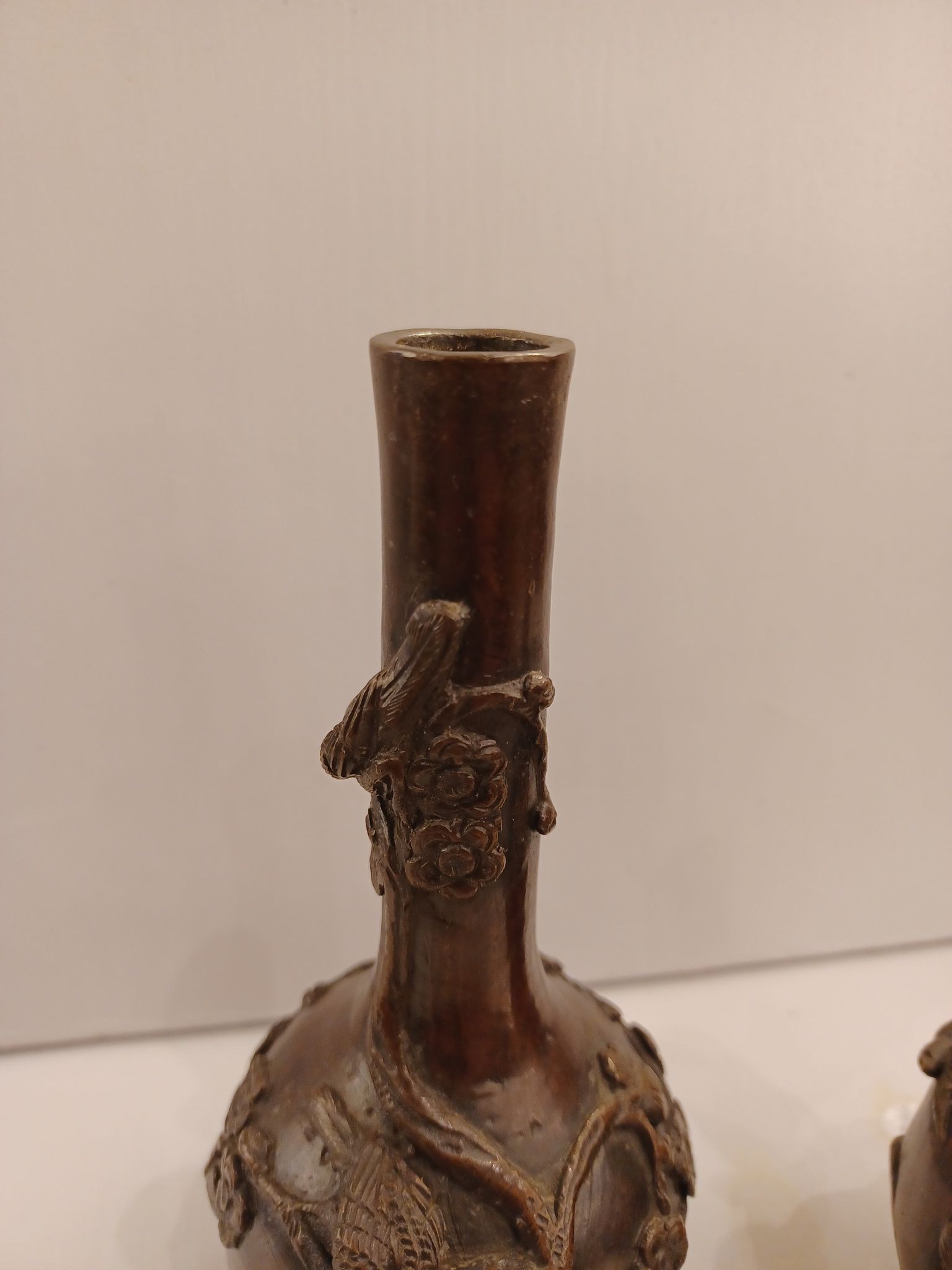 Pair of bronze soliflore vases. Japan, 19th century.