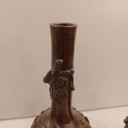 Pair of bronze soliflore vases. Japan, 19th century.