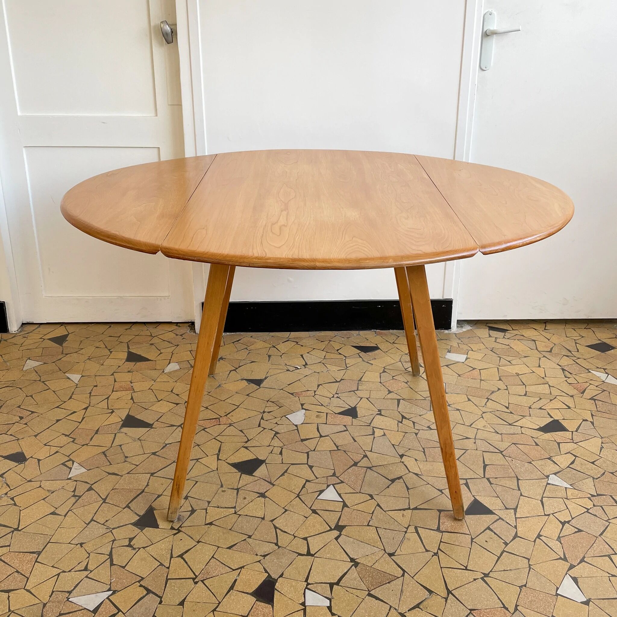 Round Ercol table with flaps