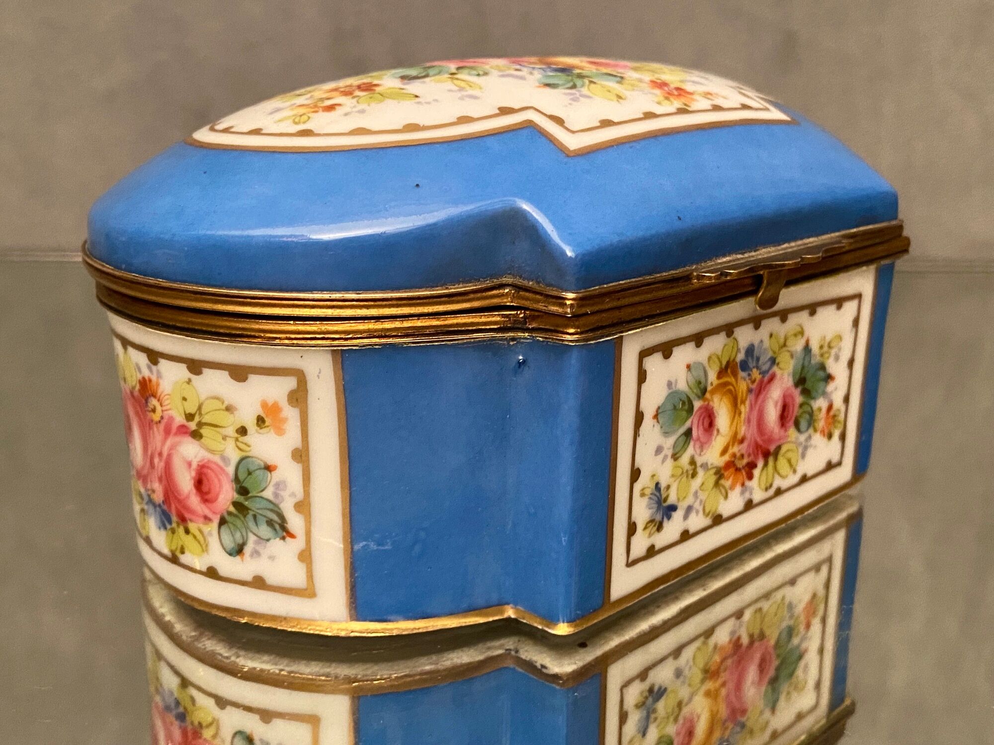 Domed porcelain box polychrome floral decoration on blue background brand Sèvres