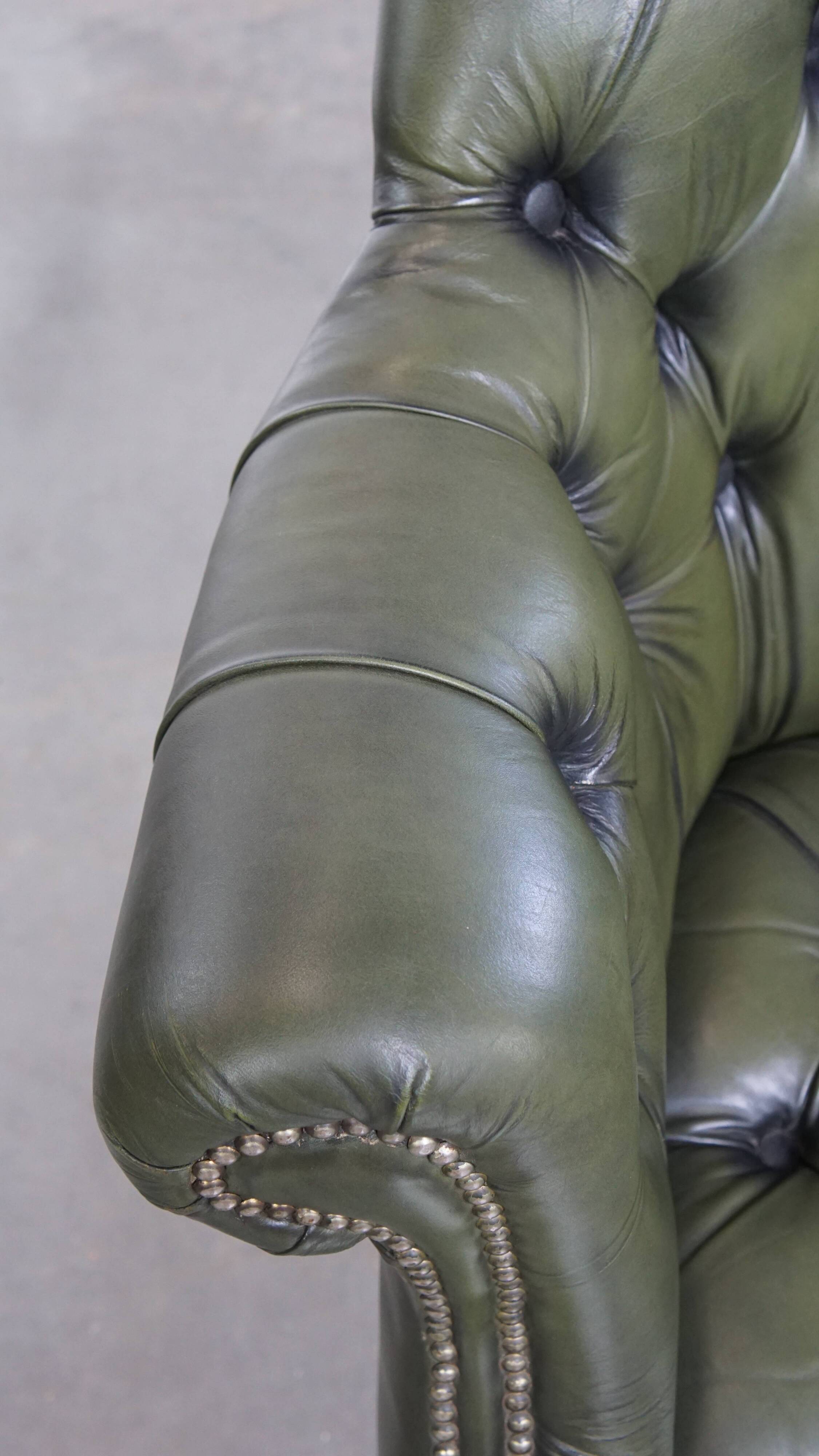 Chesterfield office chair in green cowhide leather on casters with high back