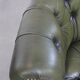 Chesterfield office chair in green cowhide leather on casters with high back
