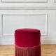 Pouf en velours rouge