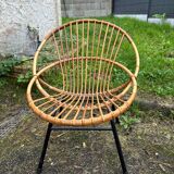 Vintage rattan armchair with metal legs