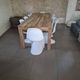 10 white chairs in the style of Verner Panton