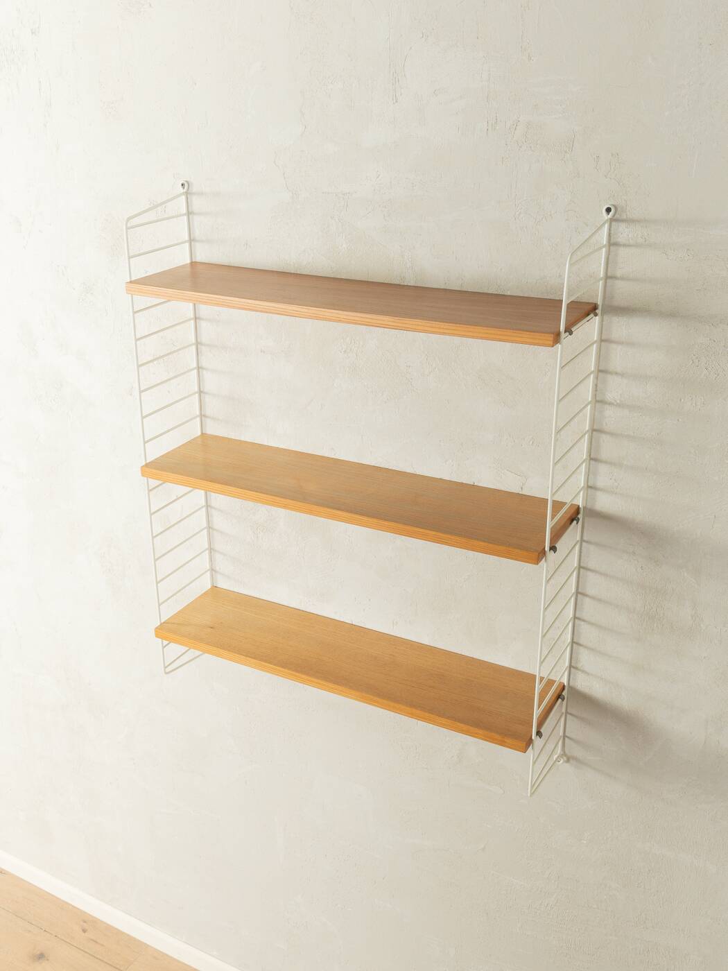 String wall shelf by Nils Strinning, 1950s