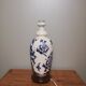 Ceramic lamp with Asian decoration with matching lampshade.