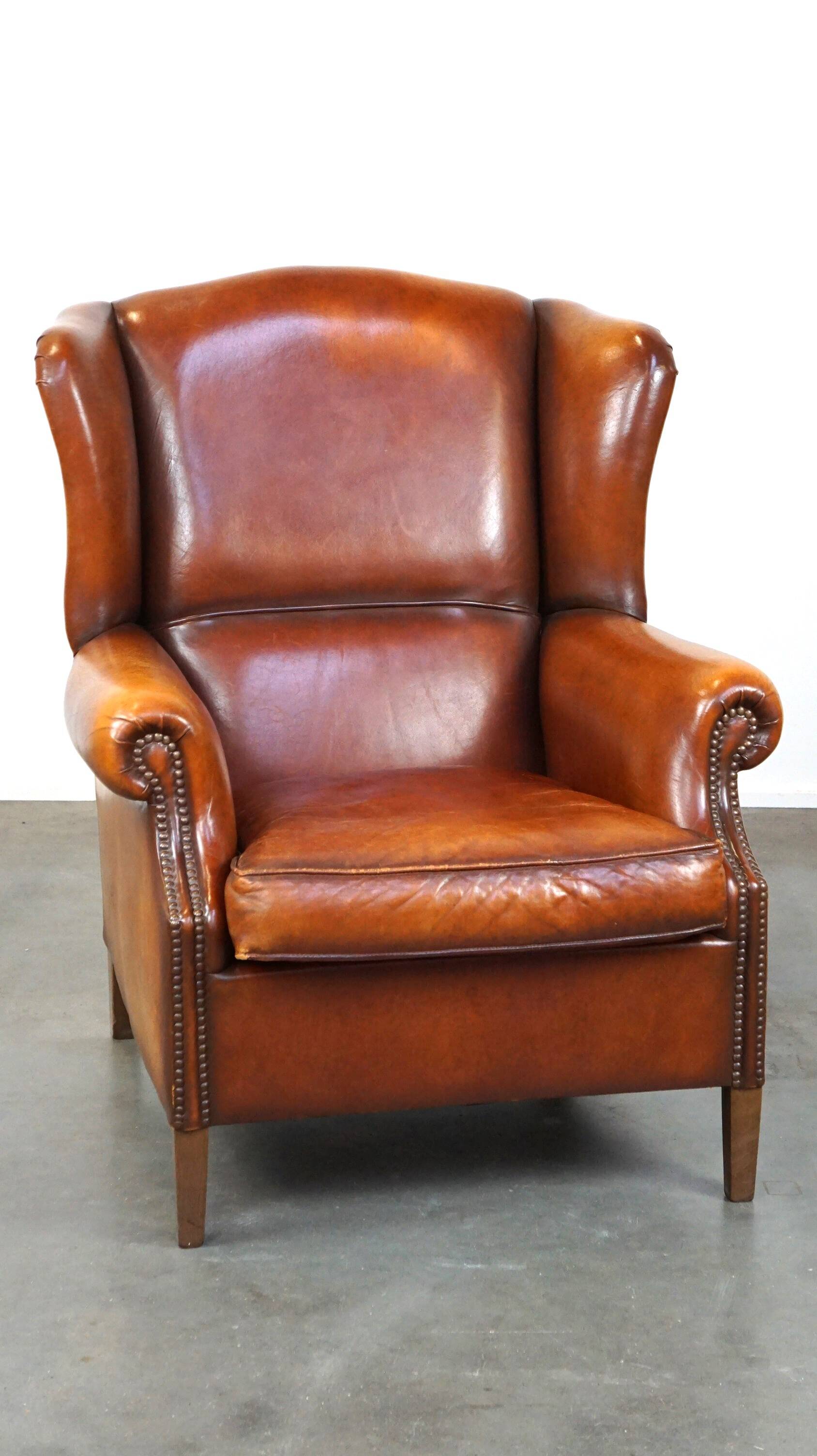 Beautiful and Comfortable Sheepskin Wingback Armchair with a Wonderful Patina
