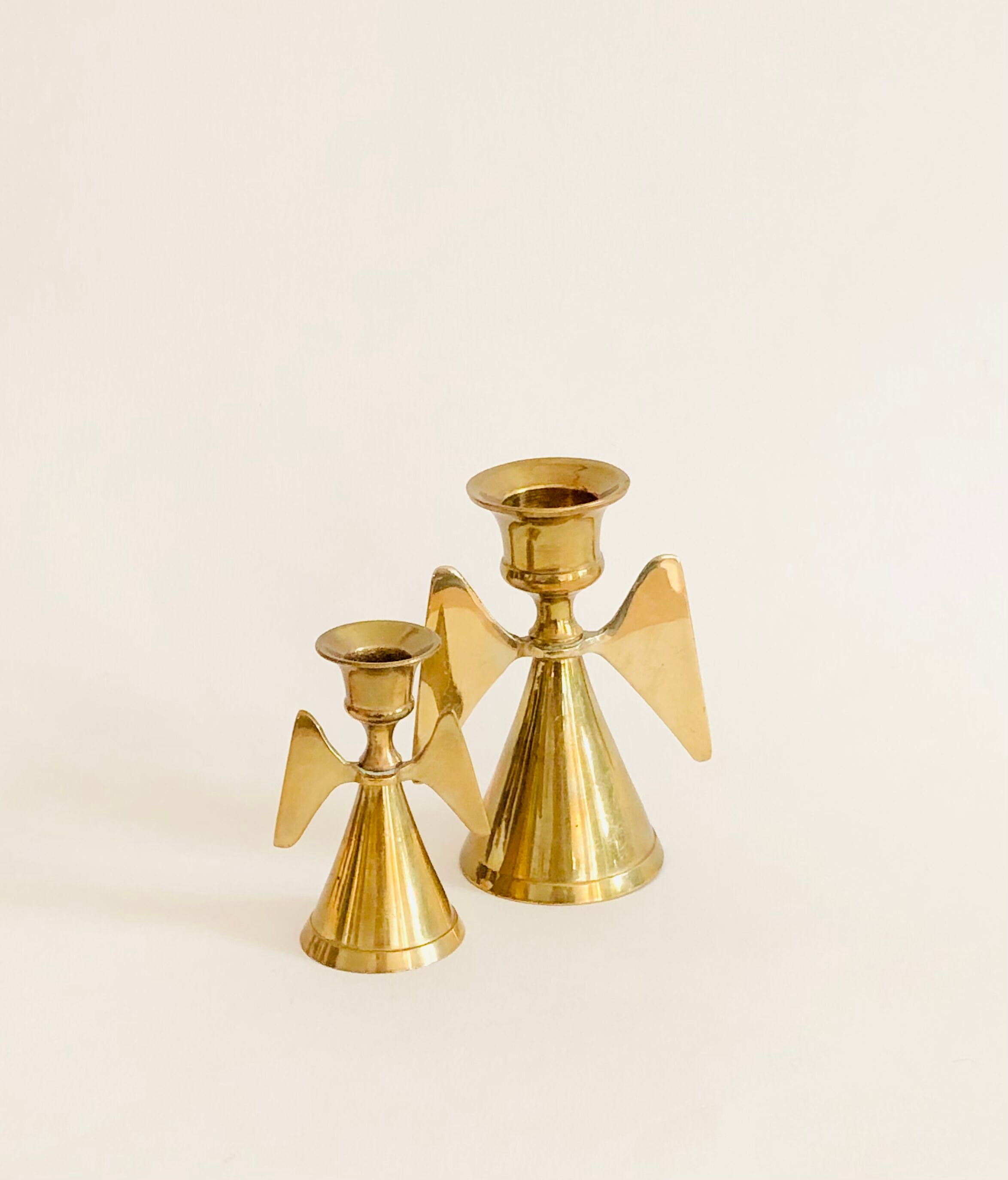 Duo of brass angel candle holders
