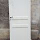 Porte ancienne en bois patine beige