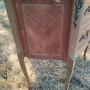 Antique commode with marquetry in the Louis XVI style and marble top.
