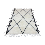 White wool rug with framing