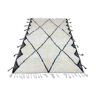 White wool rug with framing