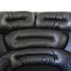 Joe Colombo Elda Chair + Ottoman in Black Leather and White Fiberglass Shell