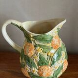 Orange slipware pitcher