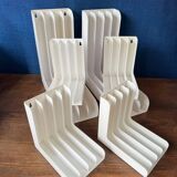 Set of 6 boomerang-shaped vinyl record racks/storage units. 1970s/80s.