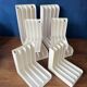Set of 6 boomerang-shaped vinyl record racks/storage units. 1970s/80s.