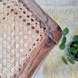 Wooden stool with cane seat