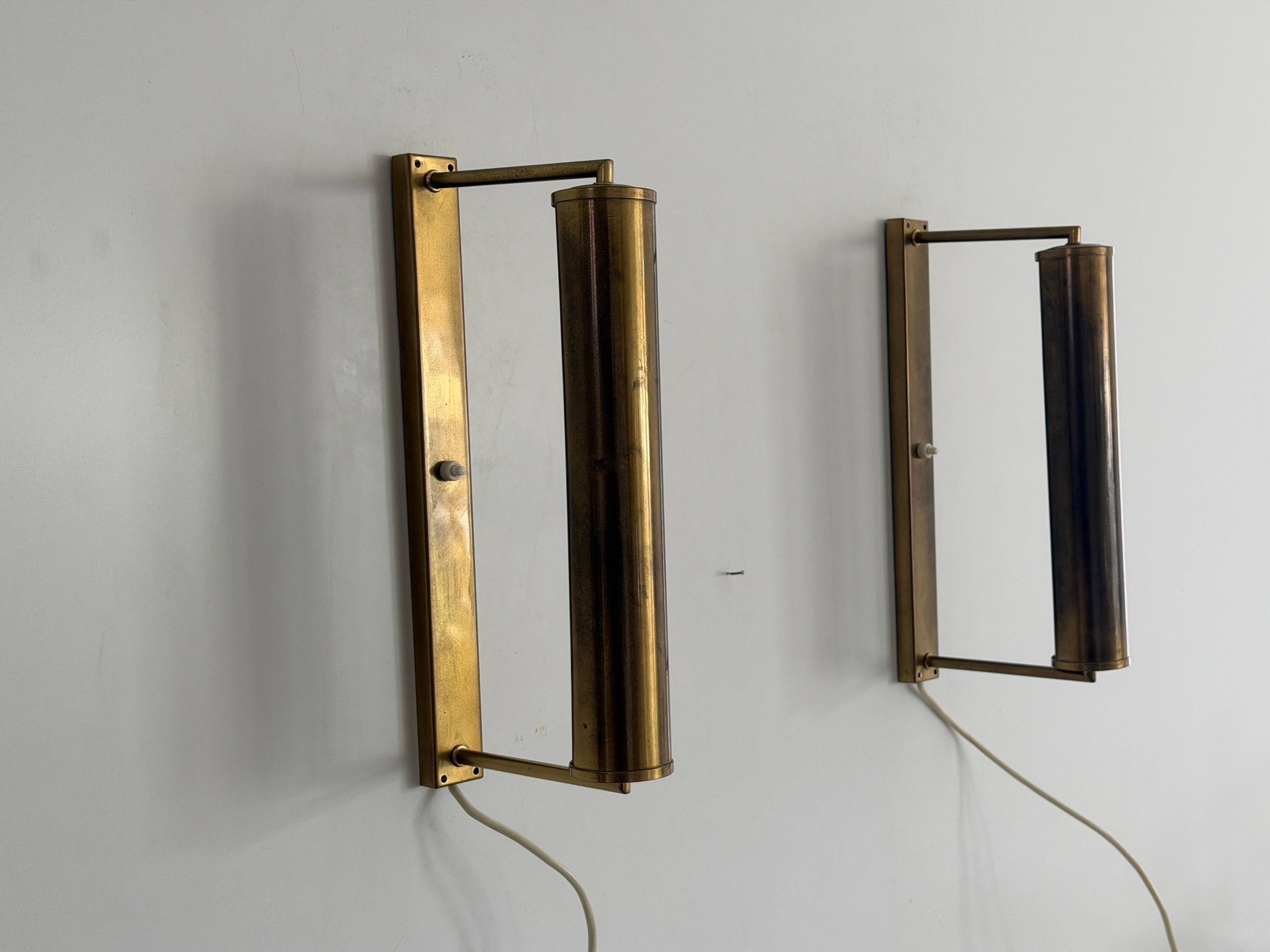 Pair of brass wall lights with adjustable heads from the mid-20th century, 1960, Germany.