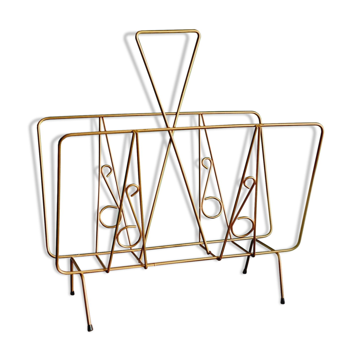 Golden metal magazine holder