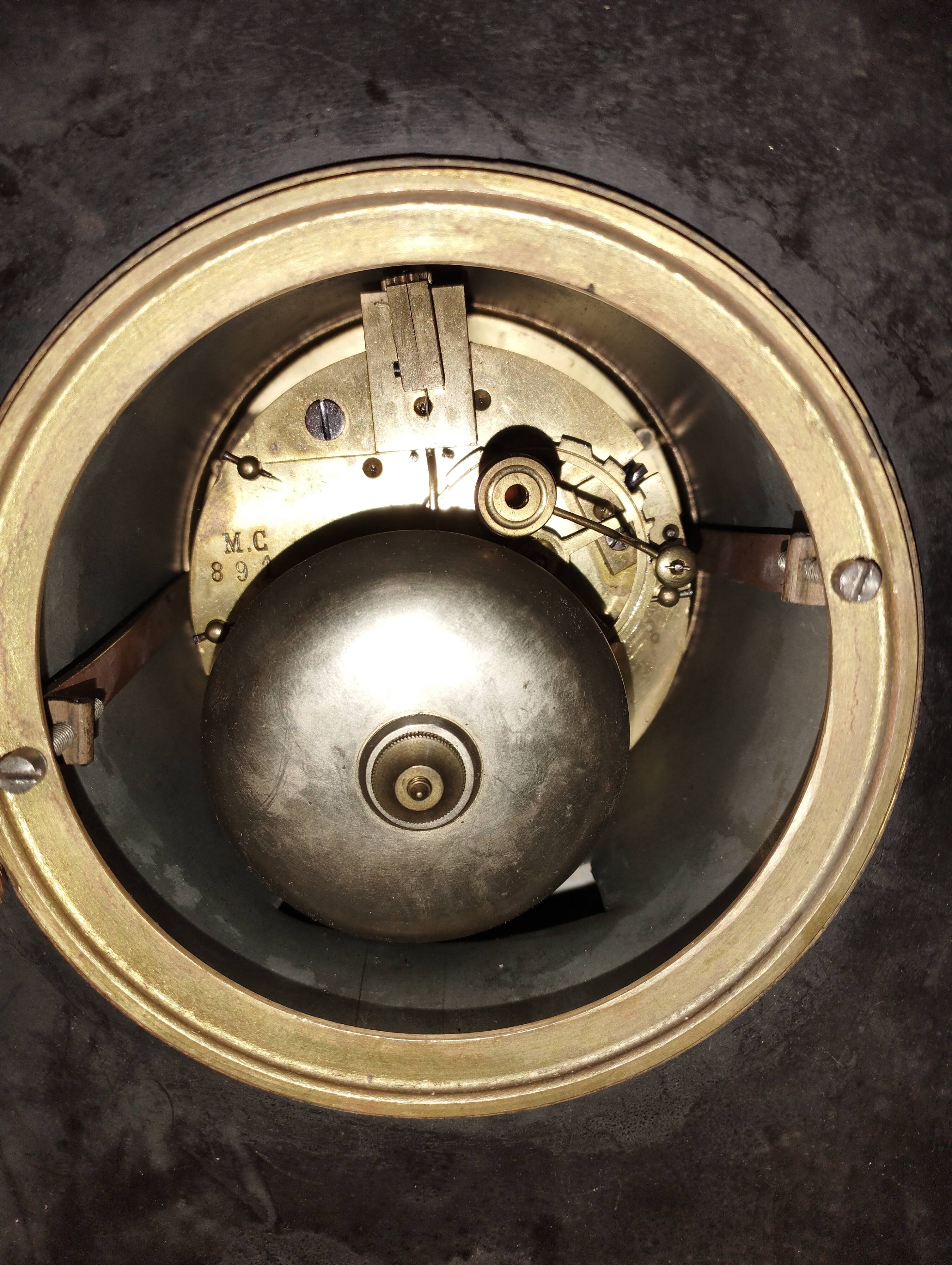 old Napoleon III marble fireplace surround with cups and pendulum