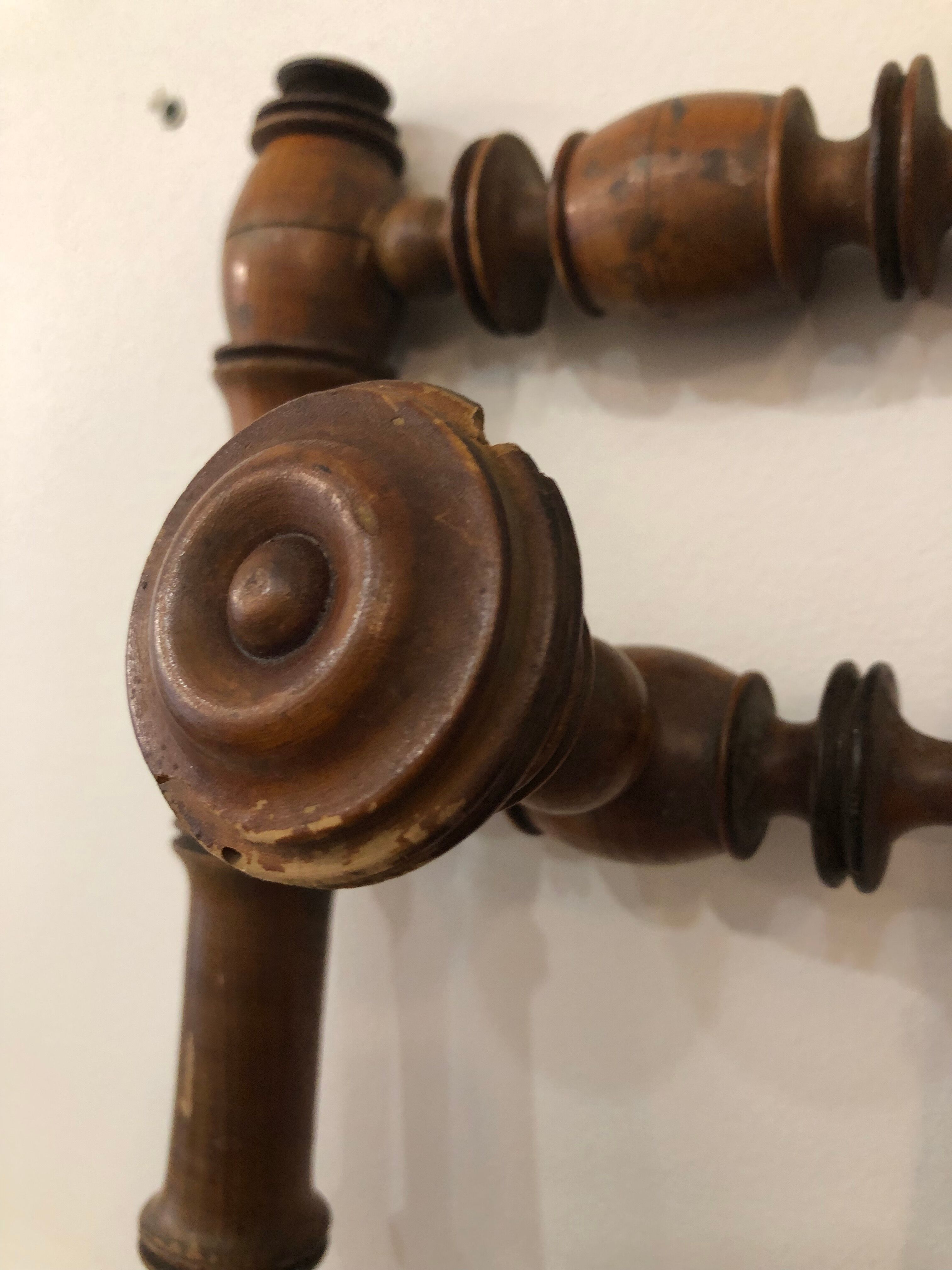 Wooden coat rack with swivel hooks