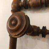 Wooden coat rack with swivel hooks
