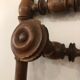 Wooden coat rack with swivel hooks