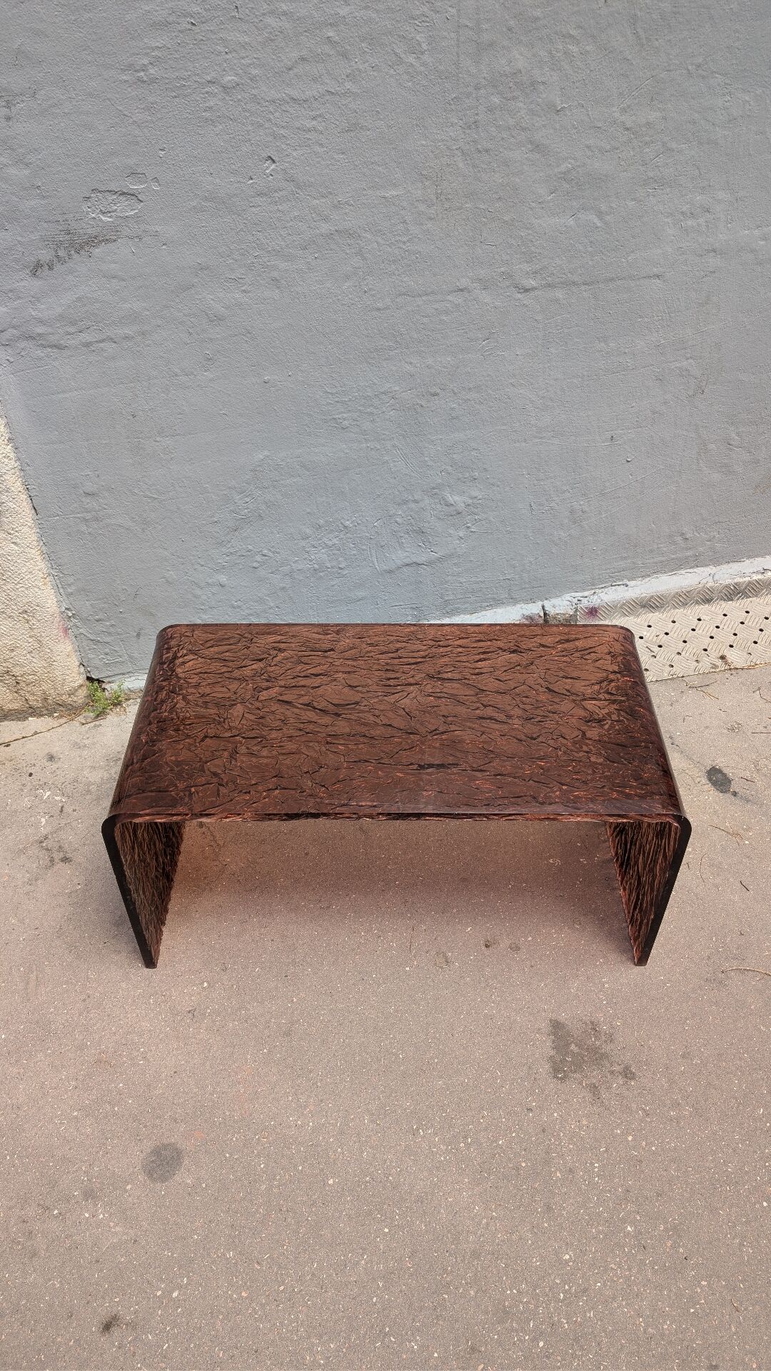 Smoked plexiglass coffee table