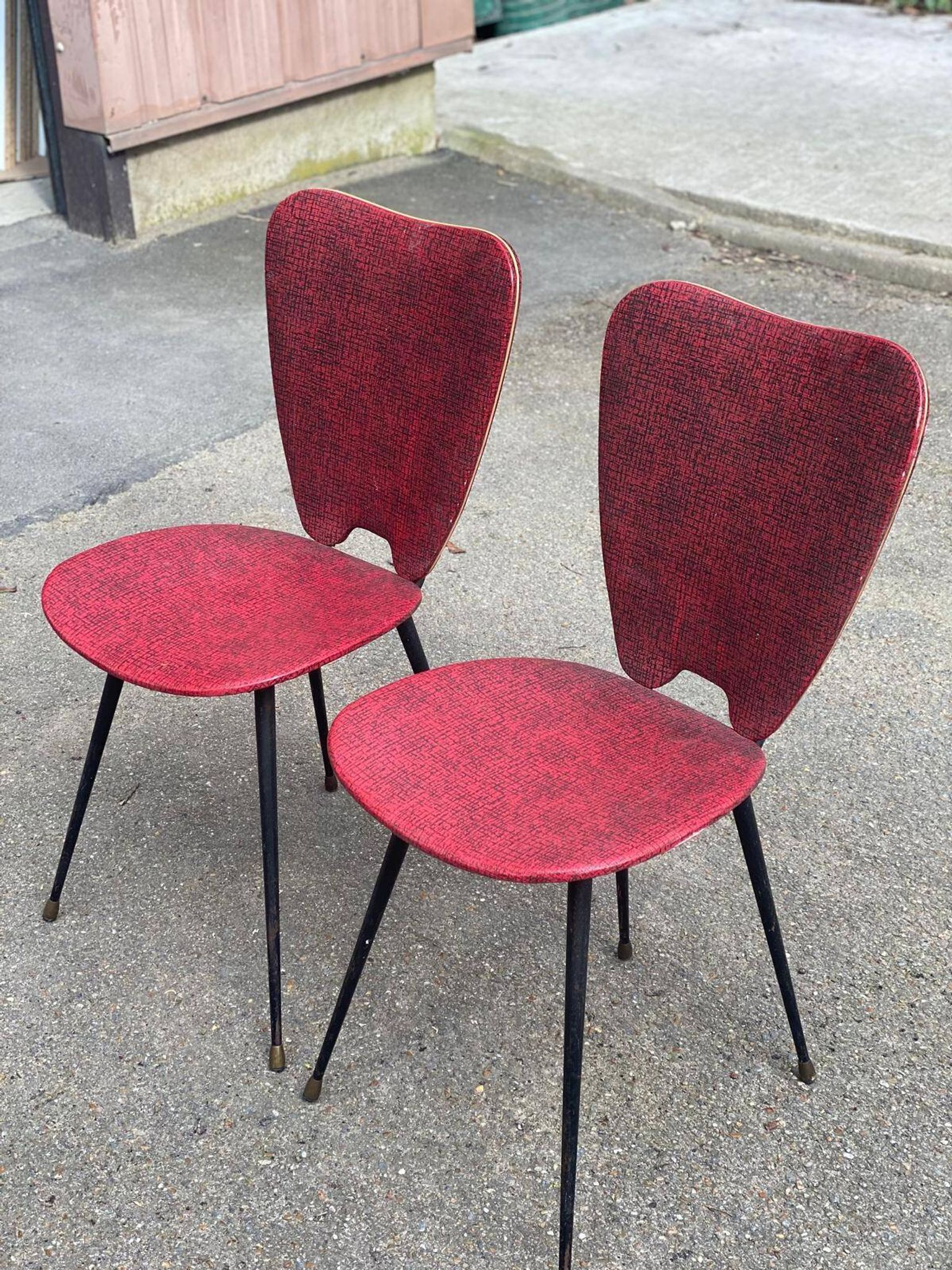 2 petal chairs in burgundy red skai leather and black metal 1950 Sery