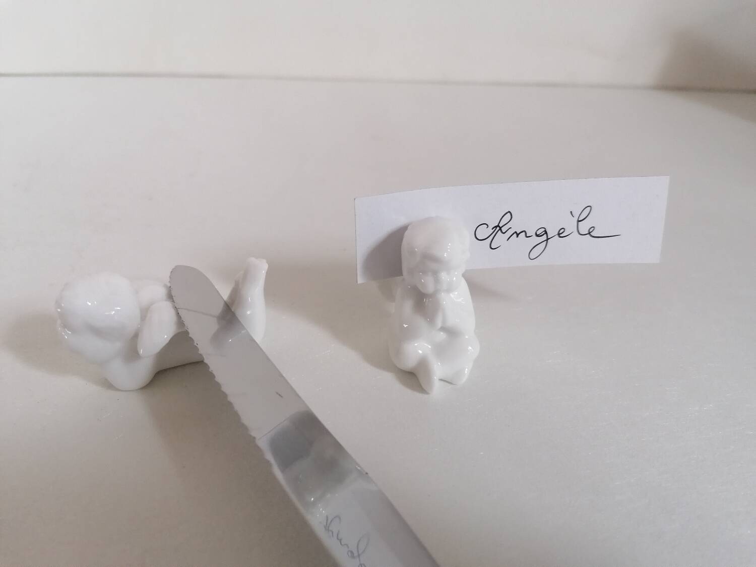 Lot 6 knife holders and 6 porcelain place markers putti angels