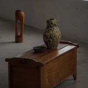 Modern Danish oak commode with decorative relief sculpture, mid-20th century.